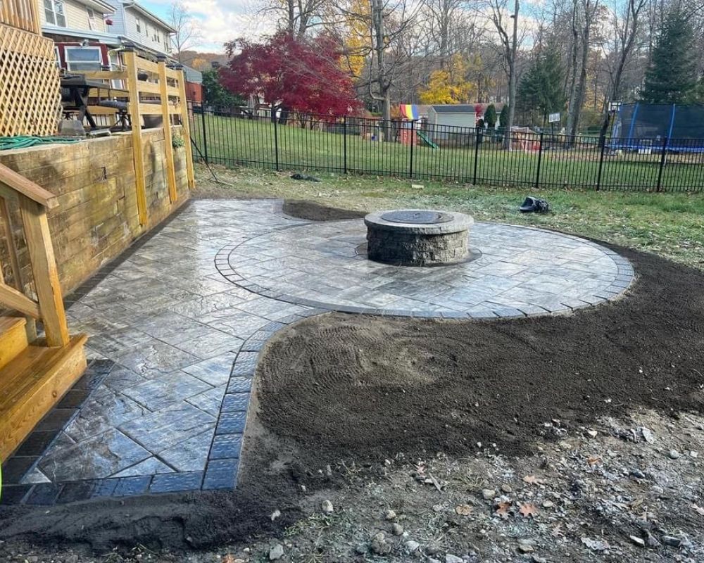 Outdoor gas fireplace installation in Carmel, IN